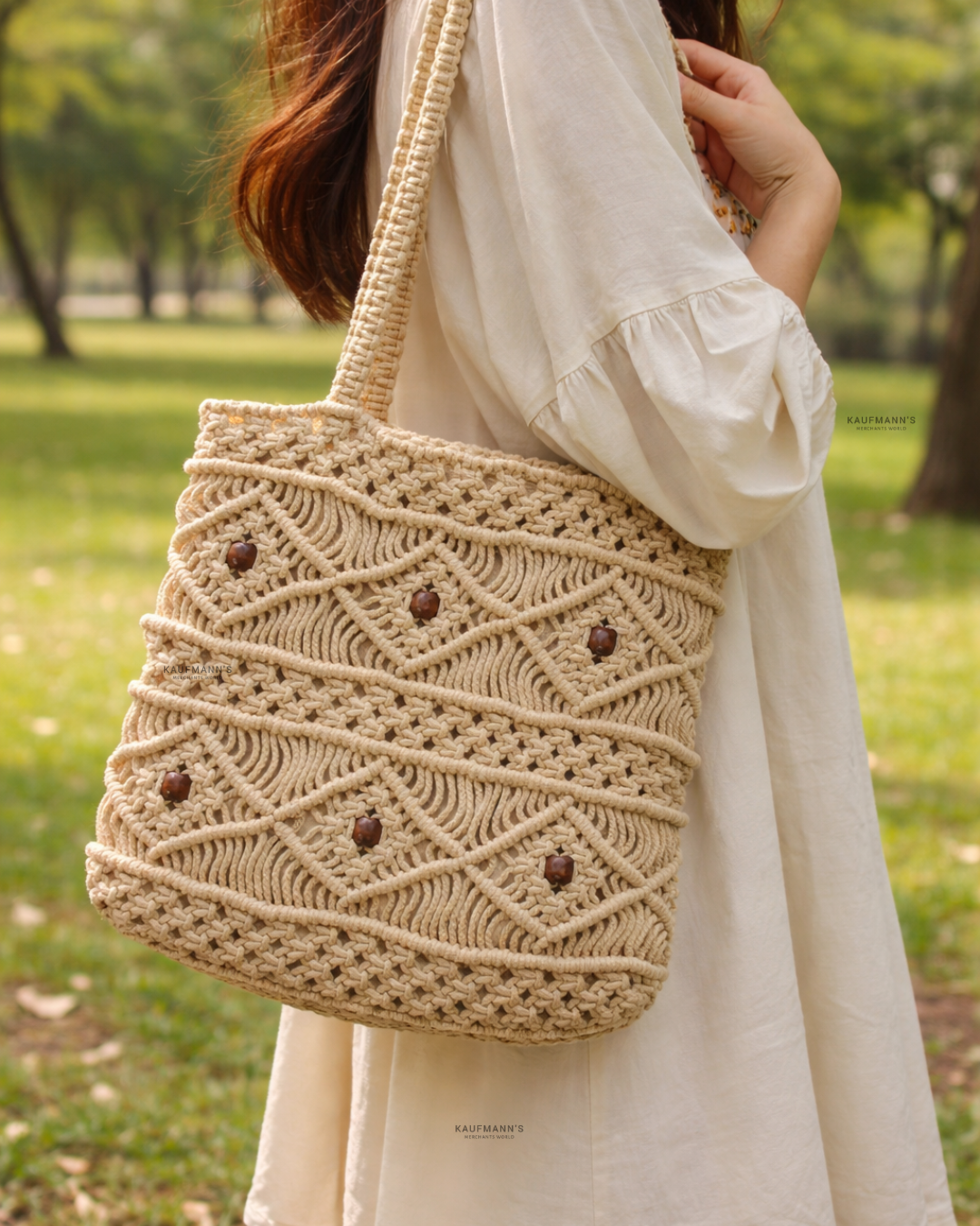 Girl holding a white macrame bag in a park setting, showcasing a stylish and ecofriendly handmade accessory with a natural outdoor background