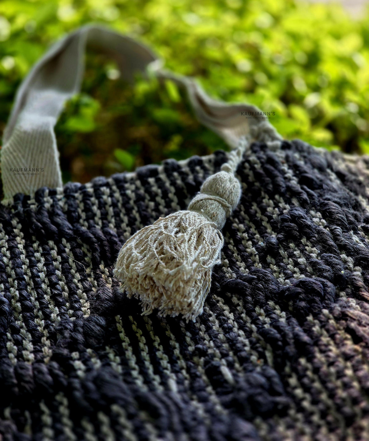 Detail image of black and white jute tote bag.