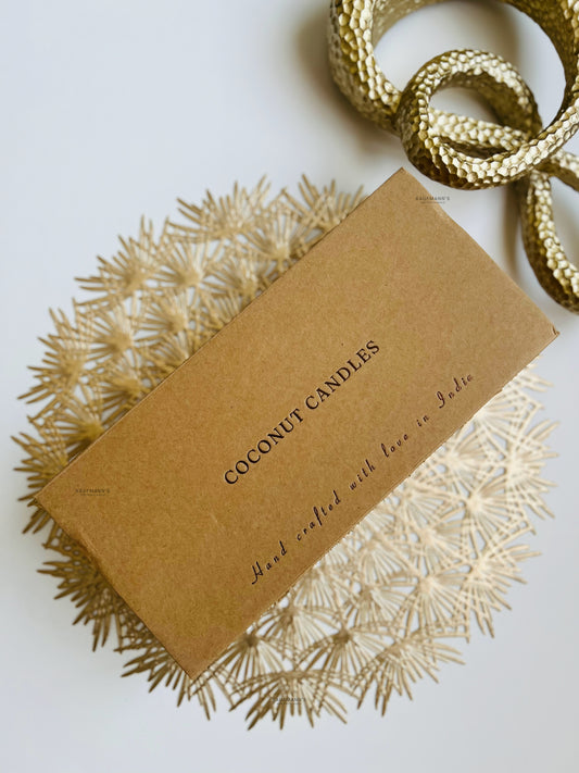 Kraft paper packaging with 'Coconut Candles' text on a decorative surface